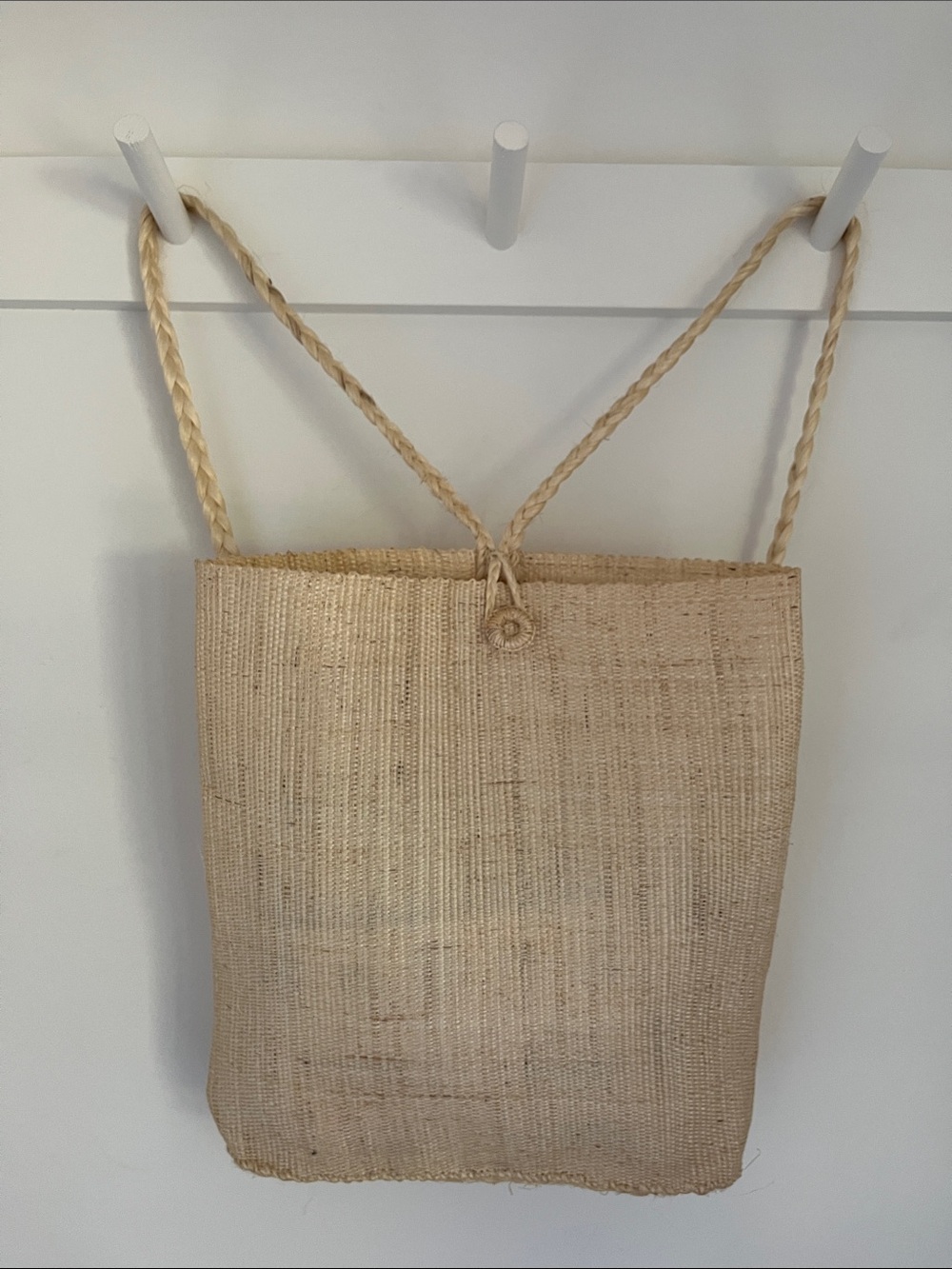 Natural raffia woven backpack